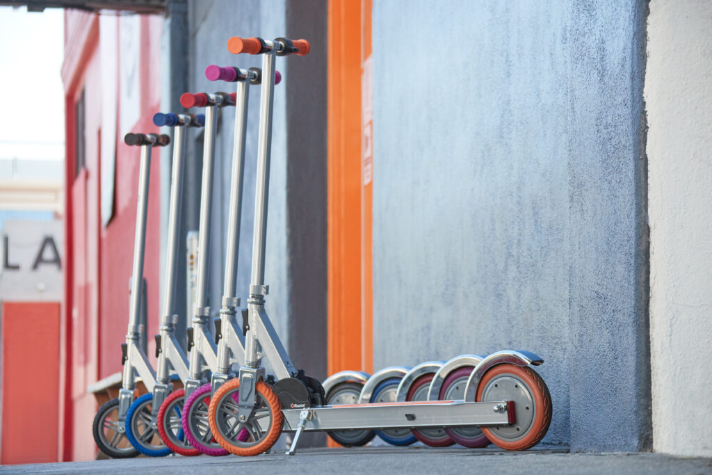 Five Razor Icon scooters lined up