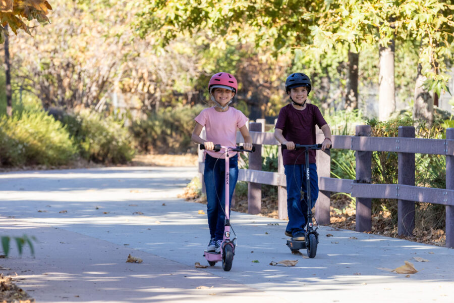 Kids riding the XLR100 on a path