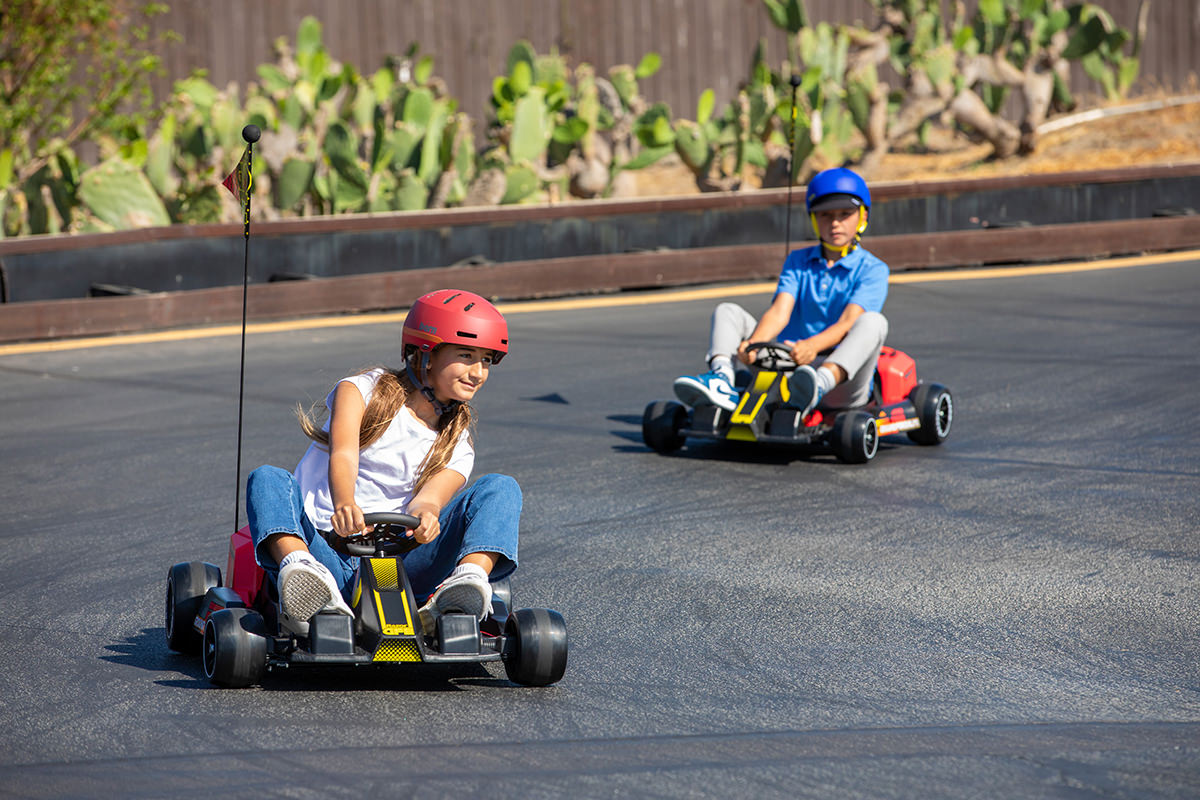 Ground Force Elite Two kids on a track riding the Ground Force Elite
